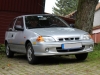 Mein kleiner Justy auf dem Parkplatz