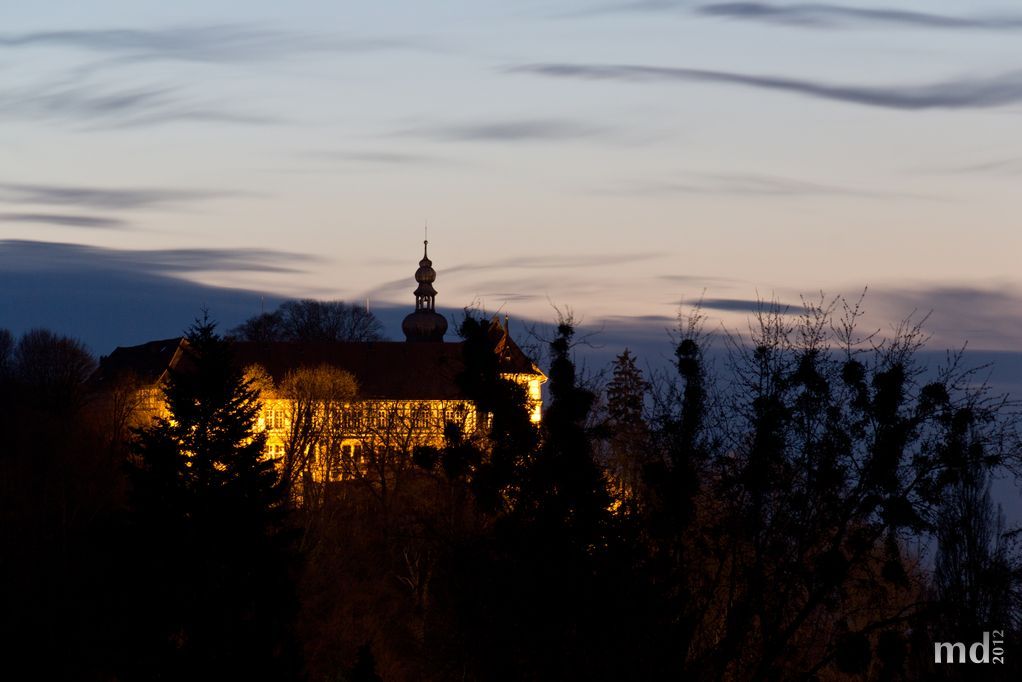 Schloss Herzberg im Gegenlicht der Abendsonne